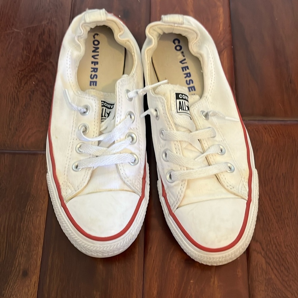Converse slip ons.